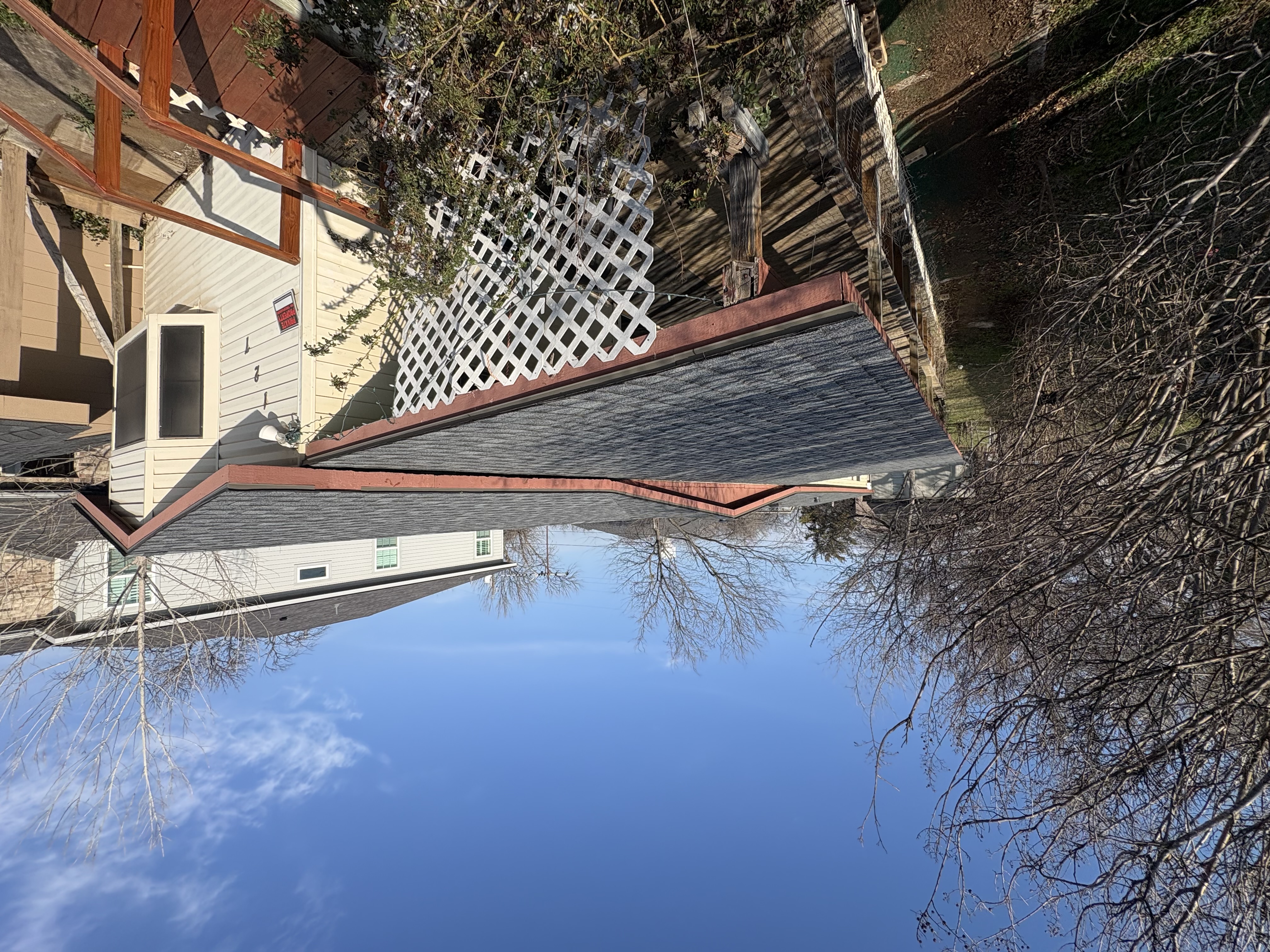 Completed roof replacement with new shingles by Guardian Ridge Roofing